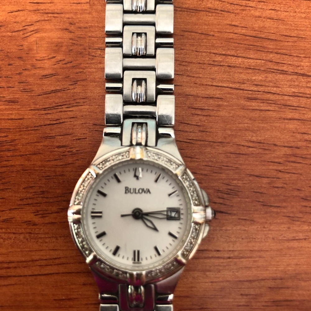 Woman’s silver Bulova wristwatch